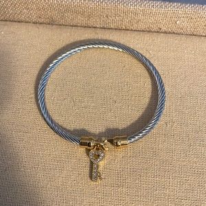 NWOT bracelet with a heart key charm